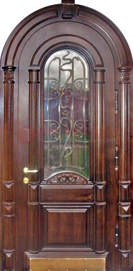 Арочная металлическая дверь массив со стеклом и ковкой ДА-50 в Краснодаре
