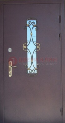 Металлическая дверь со стеклом и ковкой ДСК-77 в Краснодаре
